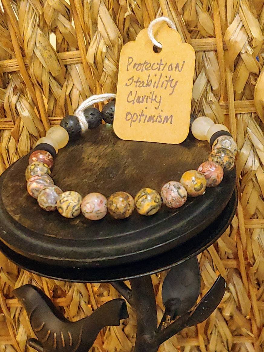 GEMSTONE LIFE'S JOURNEY genuine Crystal healing bracelet of Leopardskin Jasper & Lemon Quartz along with Lava Stone strung on 8mm beads