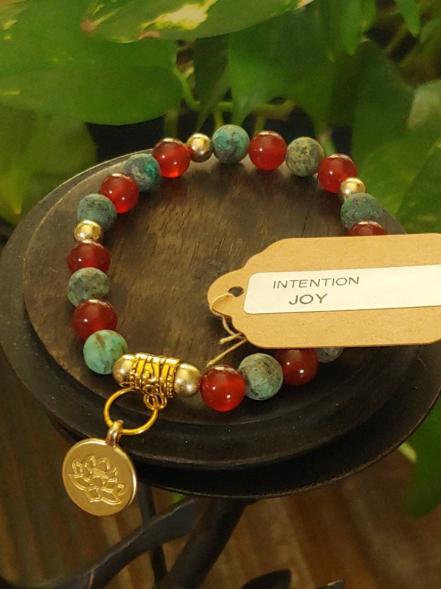 GEMSTONE JOY Intention genuine healing  bracelet SET-African Turquoise & Orange Carnelian gold spacers, Lotus charm-8 mm bds, 20 dollars each